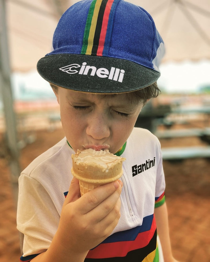 Child in World Champion Cycling Jersey eating Ice Cream